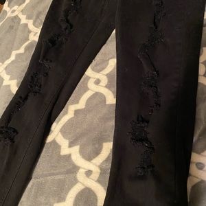 Black low rise distressed jeans